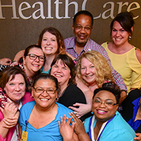 BJC employees taking a photo together after their graduation